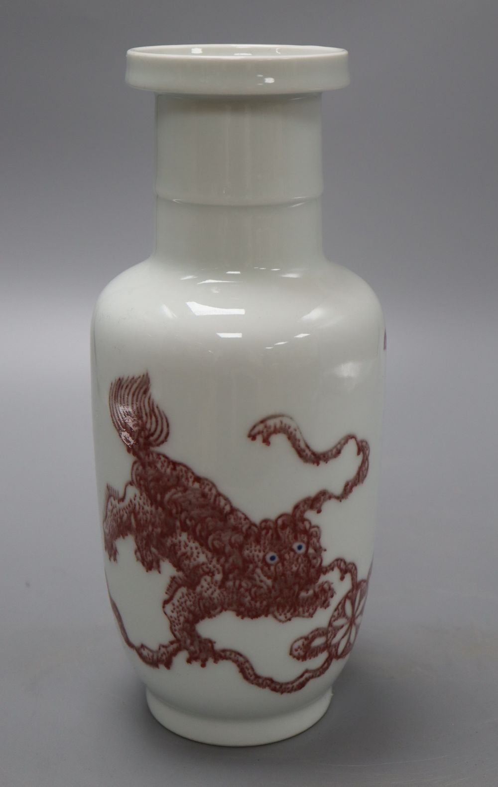 A Chinese underglaze copper red rouleau vase, height 24cm